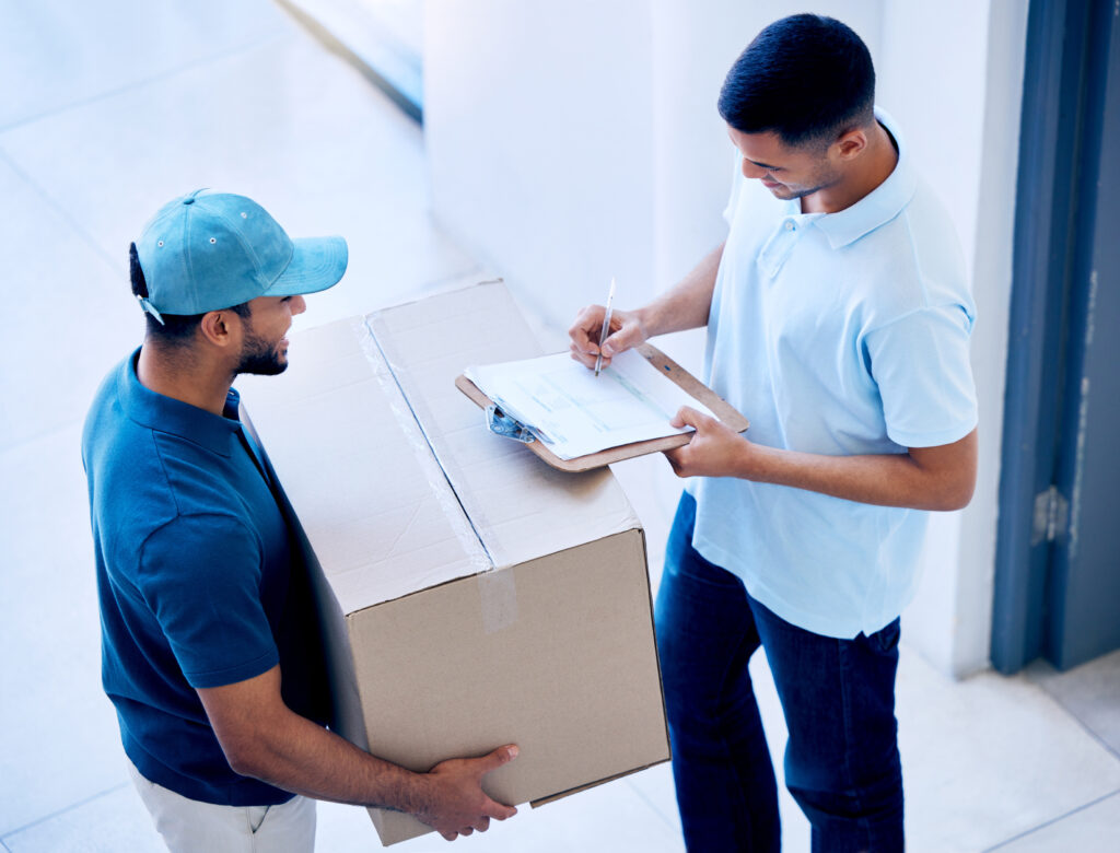 delivery box man sign paperwork shipping logistics ecommerce top view home package courier signature customer document order receipt cargo stock service scaled
